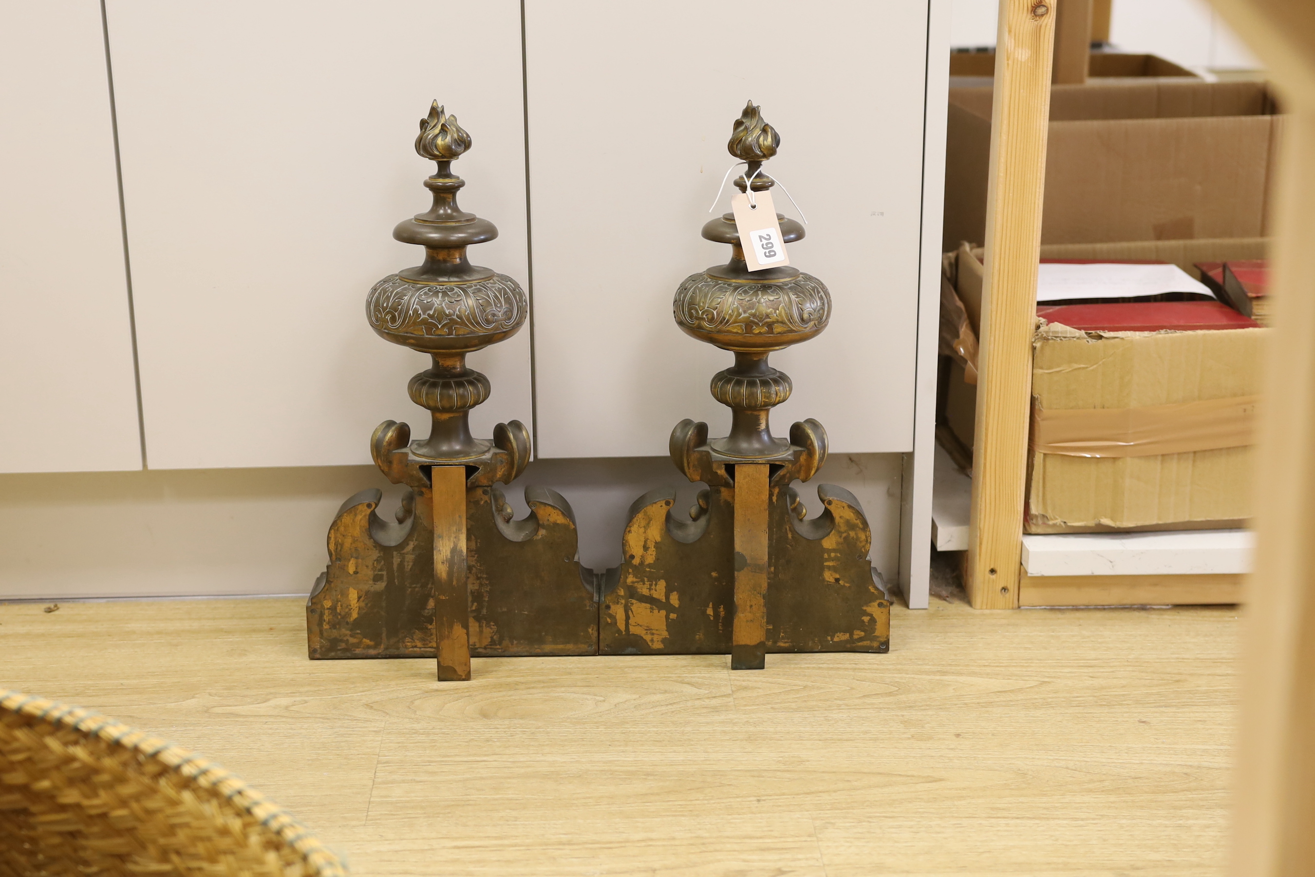 A pair of 19th century brass chenets, 50cm tall